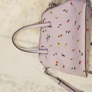 Kate Spade Floral purse. Comes with the care booklet and dust bag.